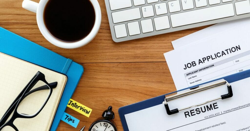 job application, resume, computer and coffee